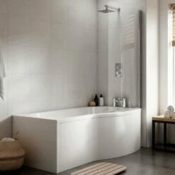 Nuie Curved B Shape 1500mm Shower Bath RH, Fixed Screen & White Panel